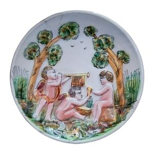 Repaired vintage Capodimonte cherub mini plate